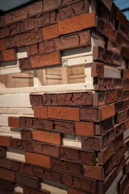 Detail of brick tower constructed of wood and handmade bricks made from soil in Frog Jump, TN